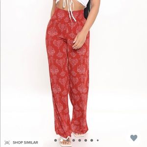 Flowey pants. Red. Never worn.